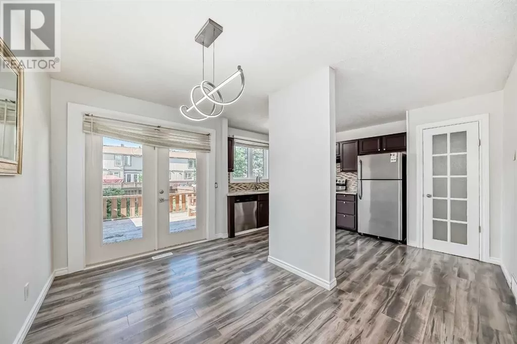 Row / Townhouse for rent: 100, 6103 Madigan Drive Ne, Calgary, Alberta T2A 5K9