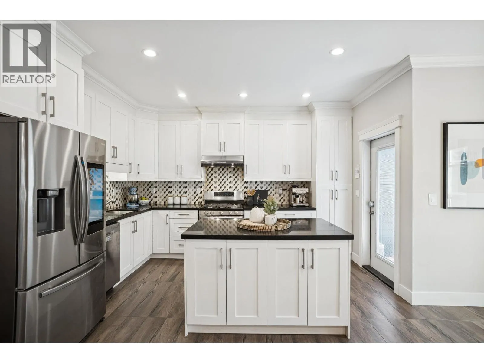 Duplex for rent: 102 910 Delestre Avenue, Coquitlam, British Columbia V3K 2G6