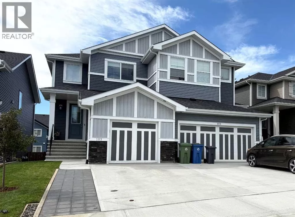 Duplex for rent: 103 Sunrise Common, Cochrane, Alberta T4C 2S2