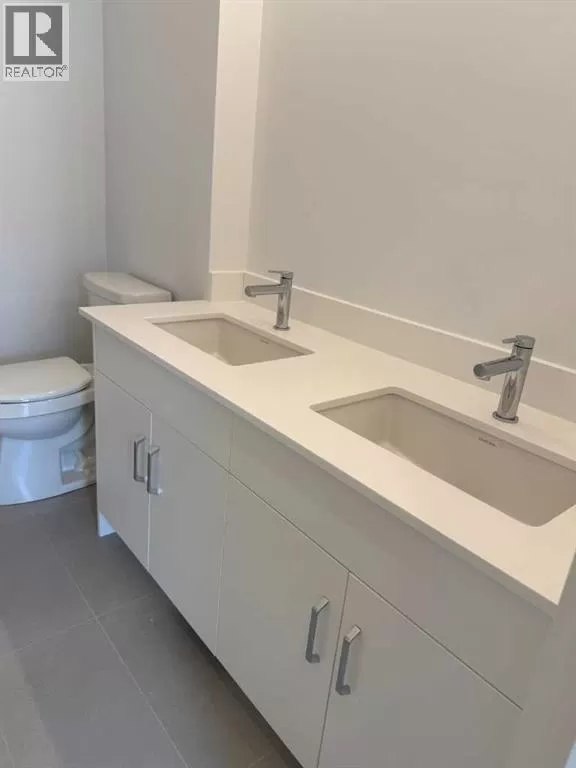 Row / Townhouse for rent: 104, 1453 Na'a Drive Sw, Calgary, Alberta T3H 6H7