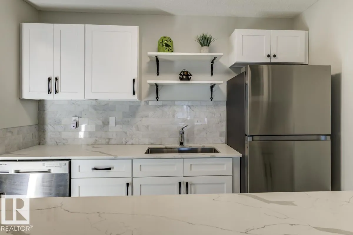 Apartment for rent: #105 10620 104 St Nw, Edmonton, Alberta T5H 2W2