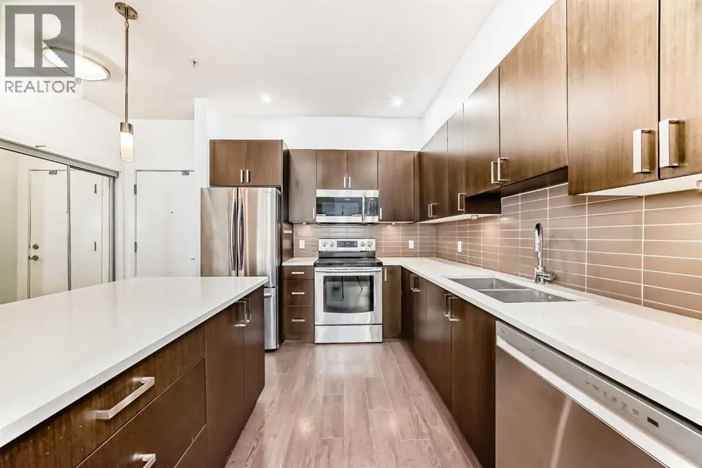 Apartment for rent: 109, 22 Auburn Bay Link Se, Calgary, Alberta T3M 1Z8