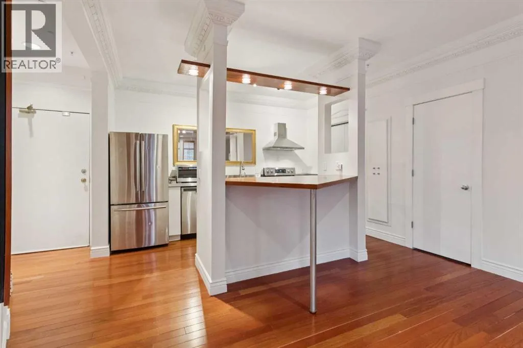 Apartment for rent: 111, 1410 2 Street Sw, Calgary, Alberta T2R 1R1