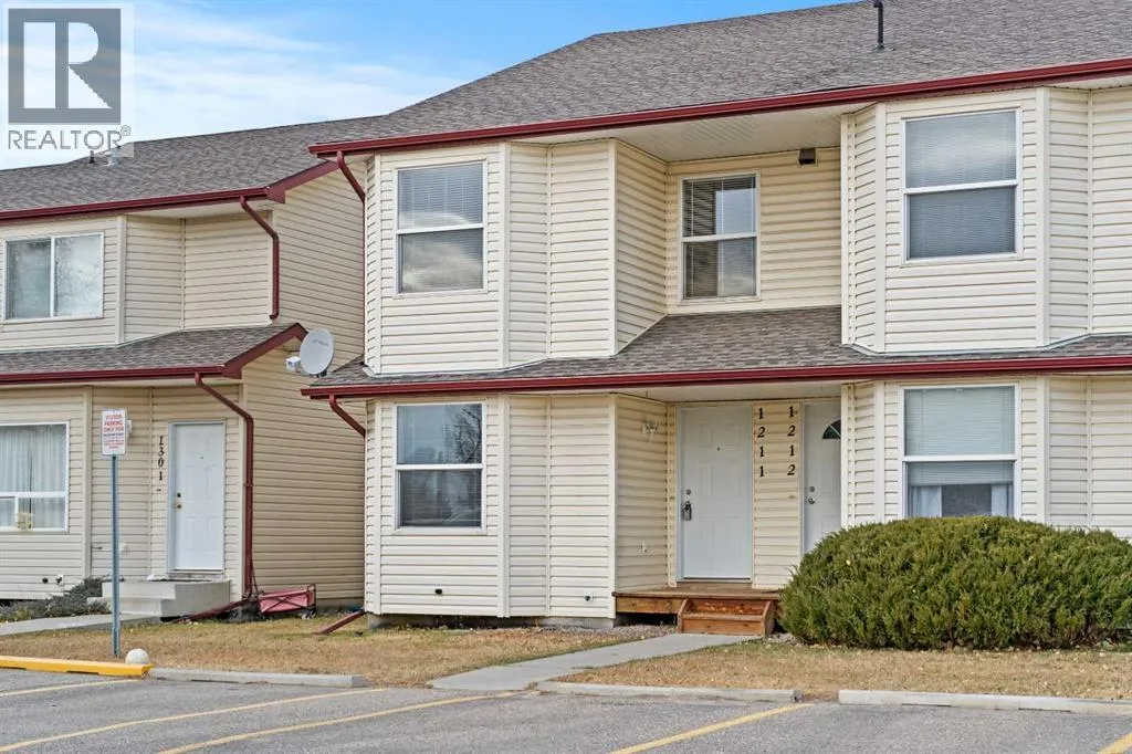 Row / Townhouse for rent: 1211 Eagleview Place Nw, High River, Alberta T1V 1X1