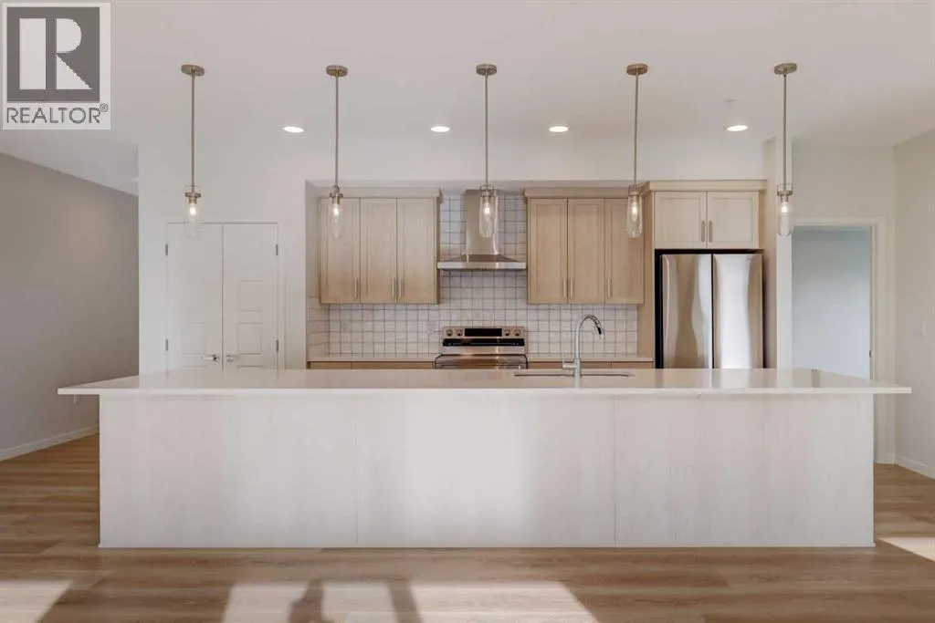 Apartment for rent: 1303, 550 Belmont Street Sw, Calgary, Alberta T2X 5Y9