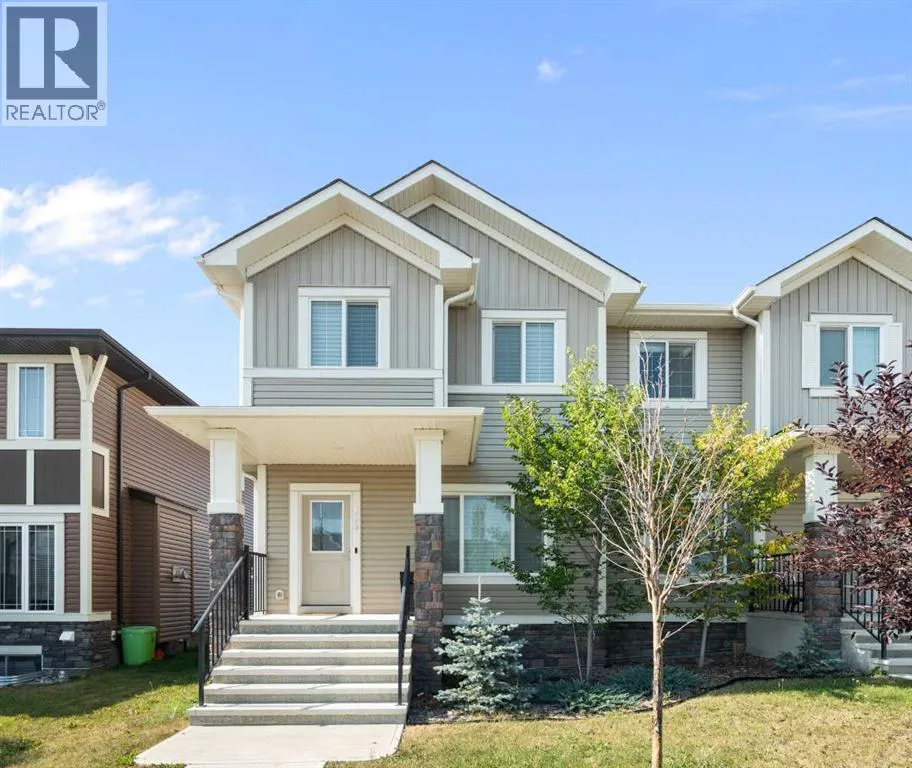 Duplex for rent: 133 Heartland Boulevard, Cochrane, Alberta T4C 2P9