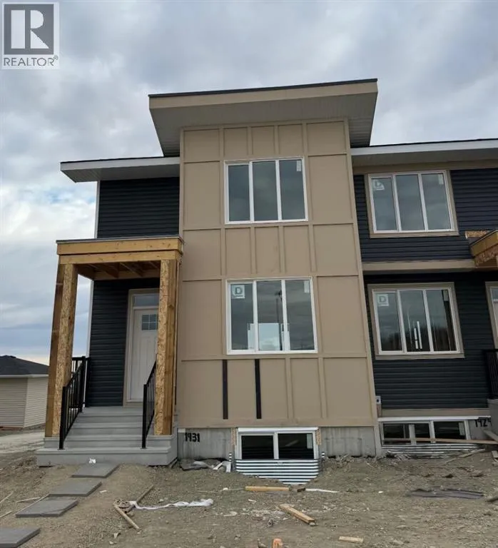 Row / Townhouse for rent: 1931 Mccaskill Drive, Crossfield, Alberta T0M 0C1