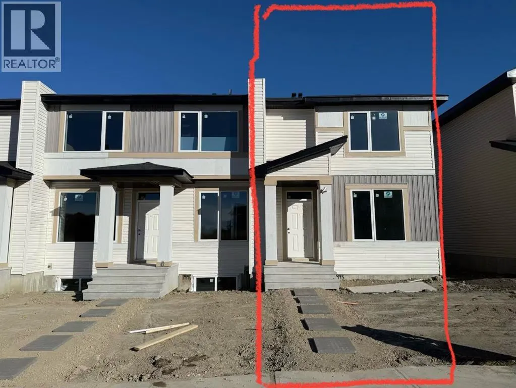 Row / Townhouse for rent: 1995 Mccaskill Drive, Crossfield, Alberta T0M 0C1