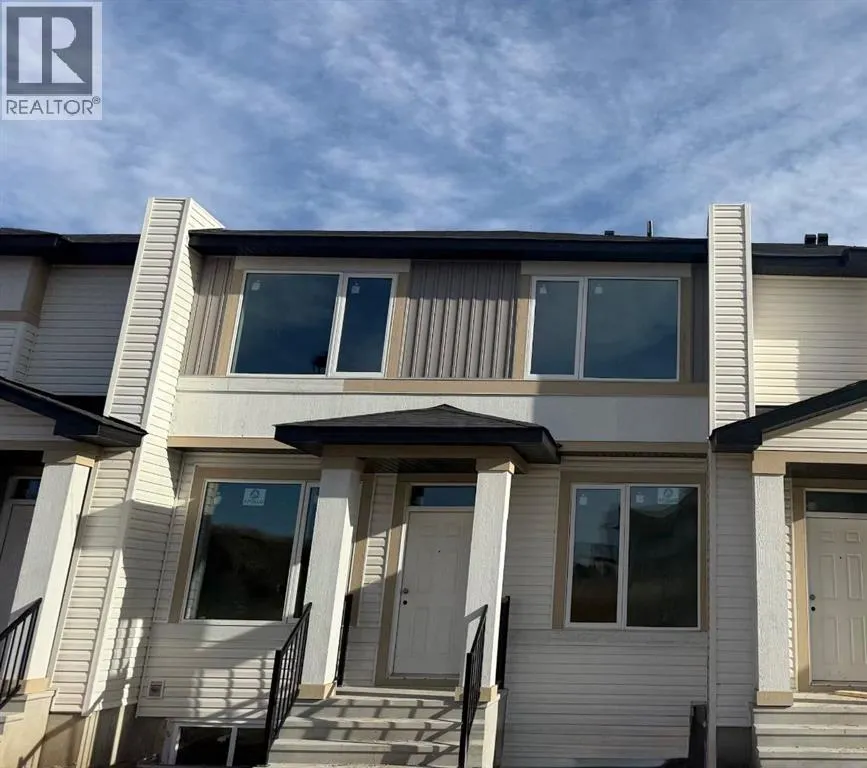 Row / Townhouse for rent: 1997 Mccaskill Drive, Crossfield, Alberta T0M 0C1