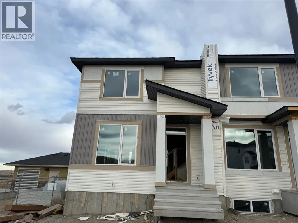 Row / Townhouse for rent: 1999 Mccaskill Drive, Crossfield, Alberta T0M 0C1