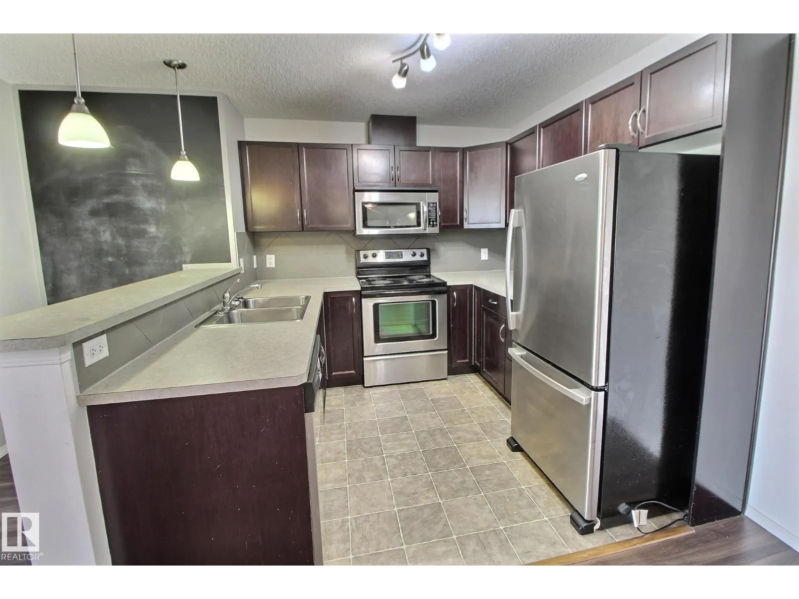 Apartment for rent: #205 5951 165 Av Nw, Edmonton, Alberta T5Y 0J6