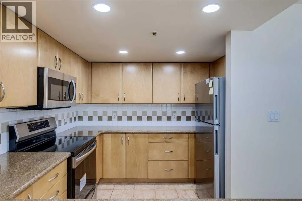 Apartment for rent: 209, 1108 6 Avenue Sw, Calgary, Alberta T2P 5K1