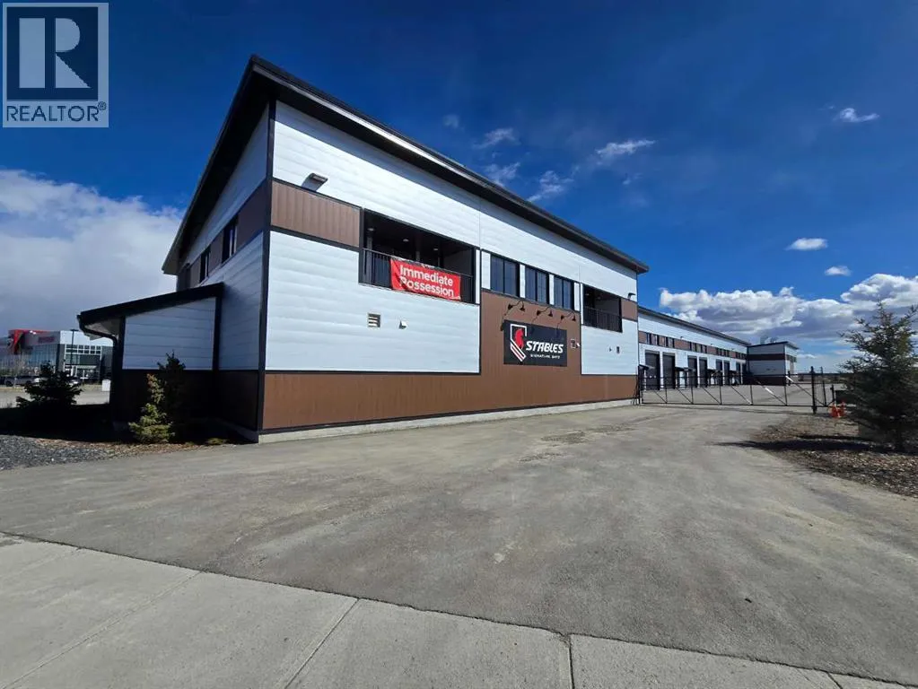 209, 5 River Heights Drive, Cochrane, Alberta T4C 0N8