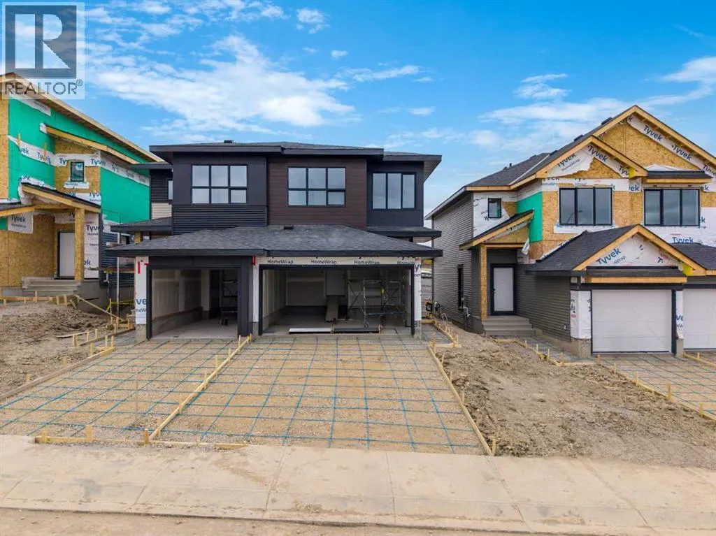 Duplex for rent: 27 Heritage Heath, Cochrane, Alberta T4C 3L3