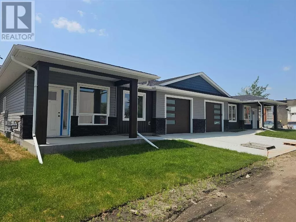 Row / Townhouse for rent: #3, 4738 49a Avenue, Lacombe, Alberta T4L 1N4