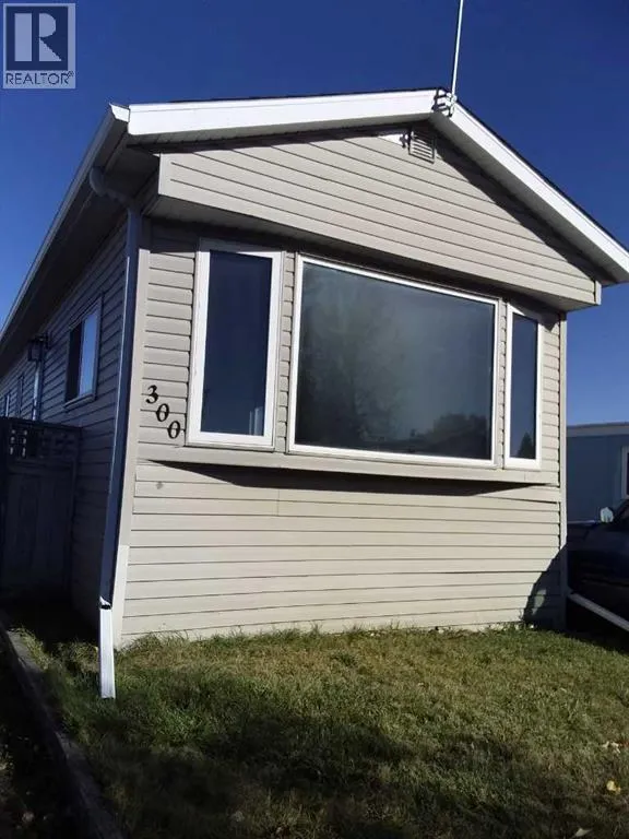 Mobile Home for rent: 300, 6220 17 Avenue Se, Calgary, Alberta T2A 0W6