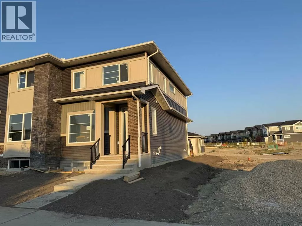 Row / Townhouse for rent: 302 Sundown Road, Cochrane, Alberta T4C 3H2