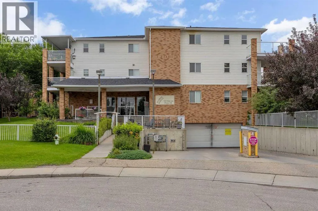 Apartment for rent: 306, 165 Manora Place Ne, Calgary, Alberta T2A 7X5