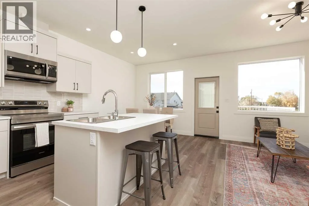 Row / Townhouse for rent: 306 S 50 W, Raymond, Alberta T0K 2S0