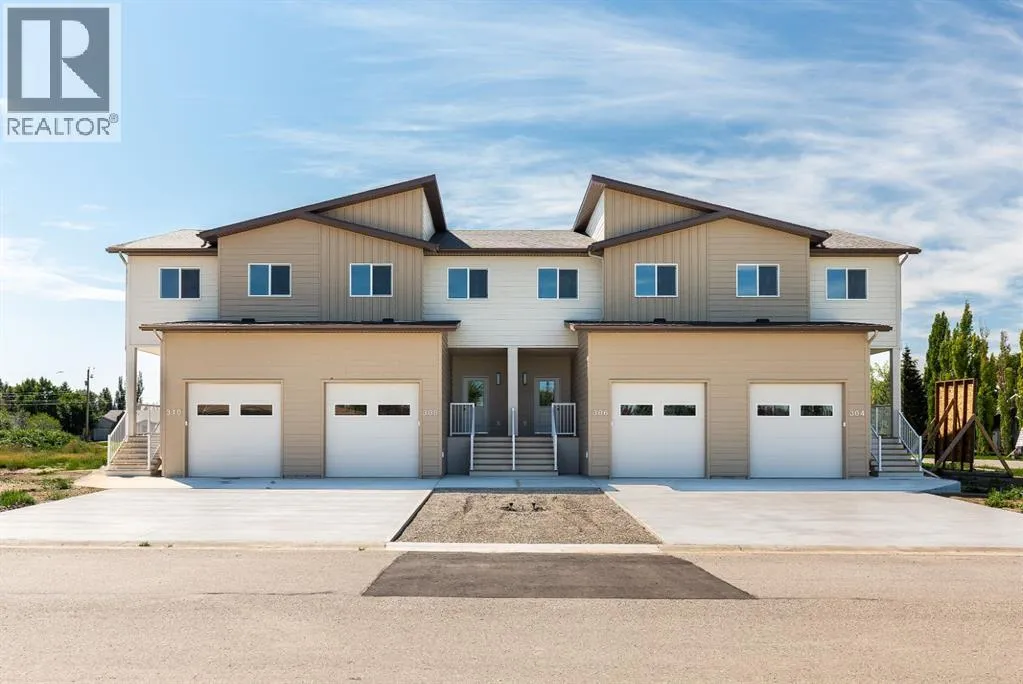 Row / Townhouse for rent: 308 S 50 W, Raymond, Alberta T0K 2S0