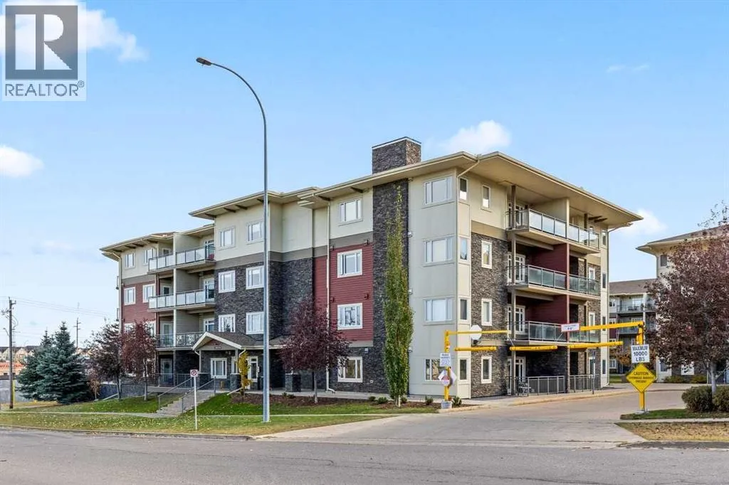 Apartment for rent: 310, 11 Millrise Drive Sw, Calgary, Alberta T2Y 3V1