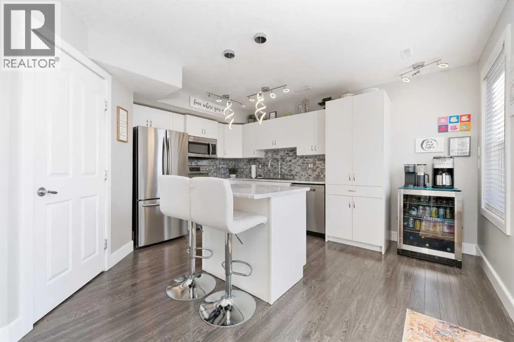 Row / Townhouse for rent: 310, 50 Westland Road, Okotoks, Alberta T1S 2H4