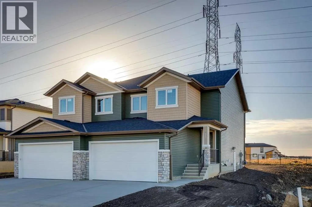 Duplex for rent: 315 Dawson Dock Way, Chestermere, Alberta T1X 2X4