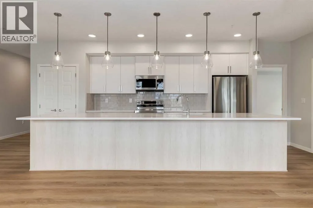 Apartment for rent: 3204, 550 Belmont Street Sw, Calgary, Alberta T2X 5Y9