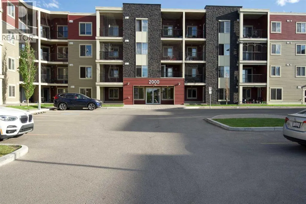 Apartment for rent: 409, 15 Saddlestone Way Ne, Calgary, Alberta T3J 0S3