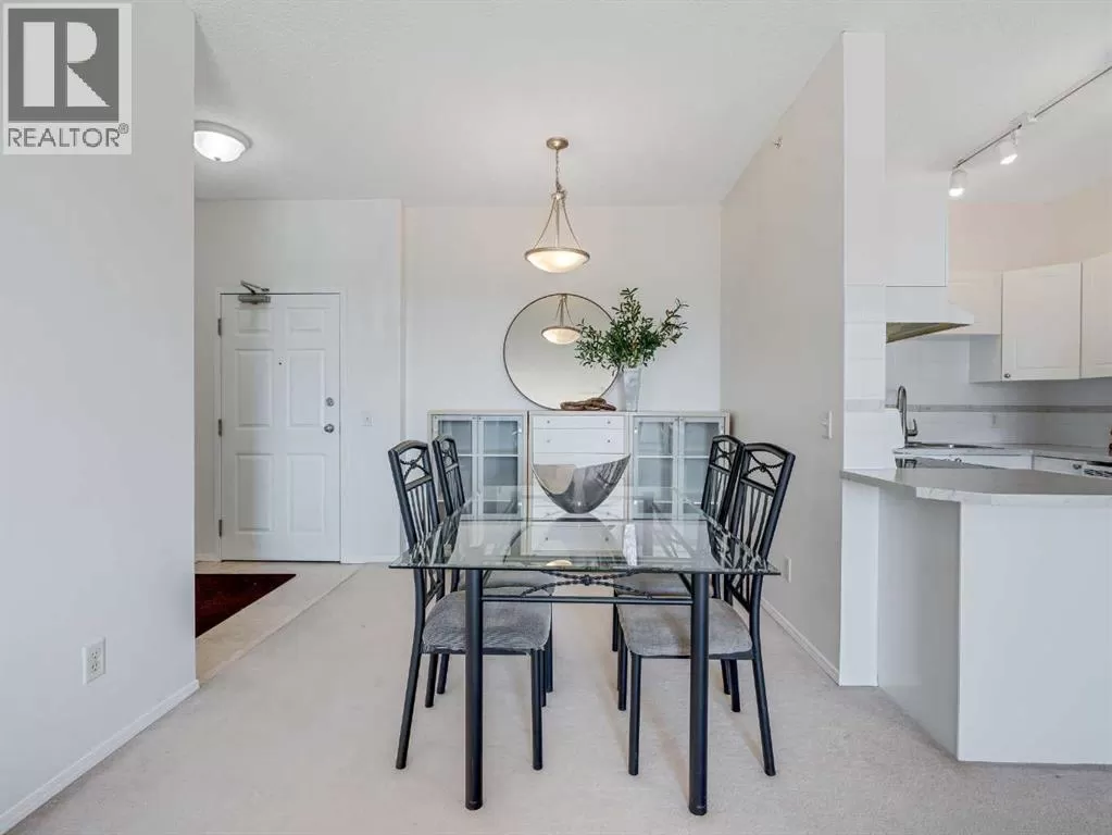 Apartment for rent: 410, 8 County Village Bay Ne, Calgary, Alberta T3K 5J7