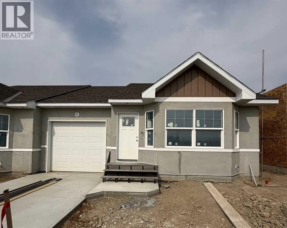 Row / Townhouse for rent: 421 Meadowlark Way, Vulcan, Alberta T0L 2B0