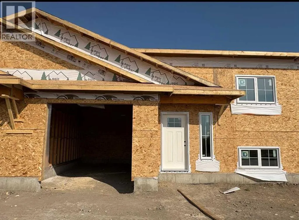 Row / Townhouse for rent: 425 Meadowlark Way, Vulcan, Alberta T0L 2B0