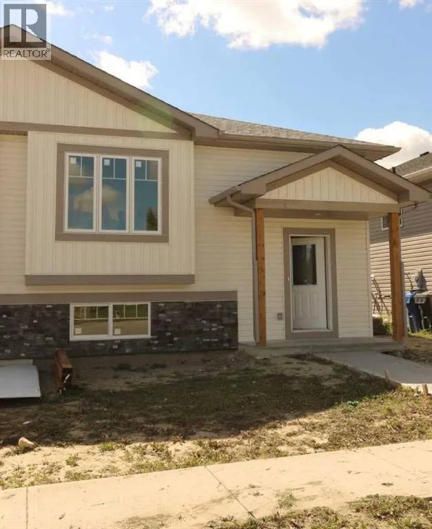 Duplex for rent: 443 Henricks Drive, Irricana, Alberta T0M 1G0
