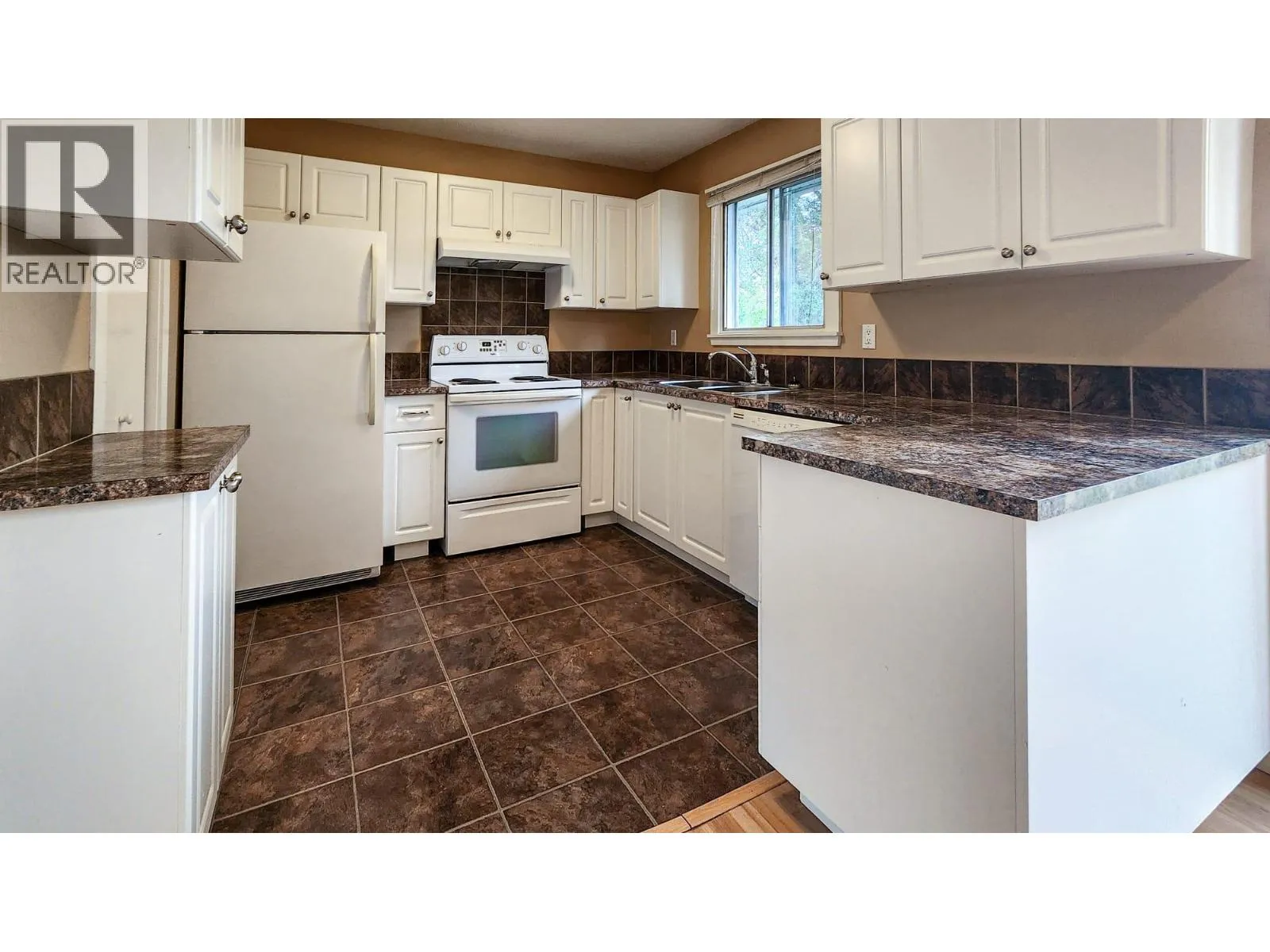 Row / Townhouse for rent: 592 Mccurdy Road, Kelowna, British Columbia V1X 2P5