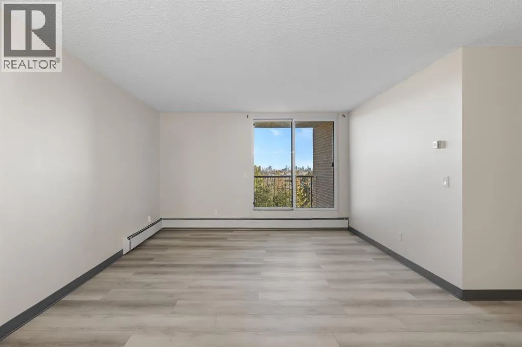 Apartment for rent: 704, 4944 Dalton Drive Nw, Calgary, Alberta T3A 2E6