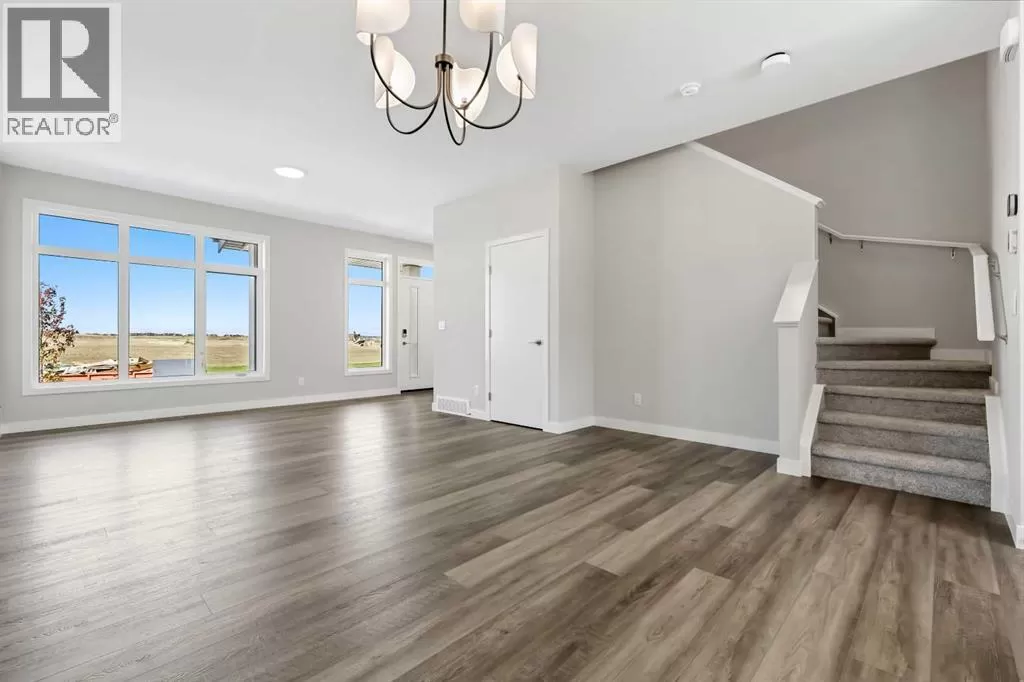 Duplex for rent: 7067 Rangeview Avenue Se, Calgary, Alberta T3S 0R1