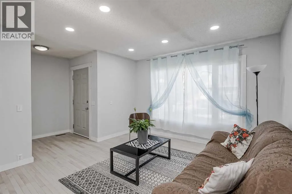 Duplex for rent: 72 Strathcona Crescent, Calgary, Alberta T3H 1L1