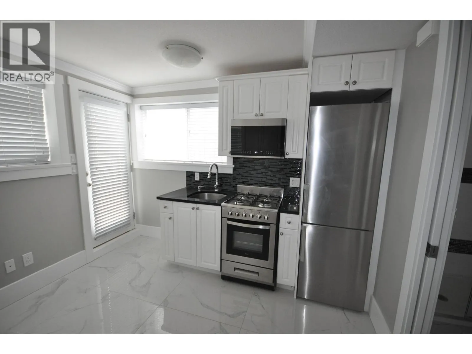 House for rent: 7828 Prince A Street, Vancouver, British Columbia V5X 3Z7