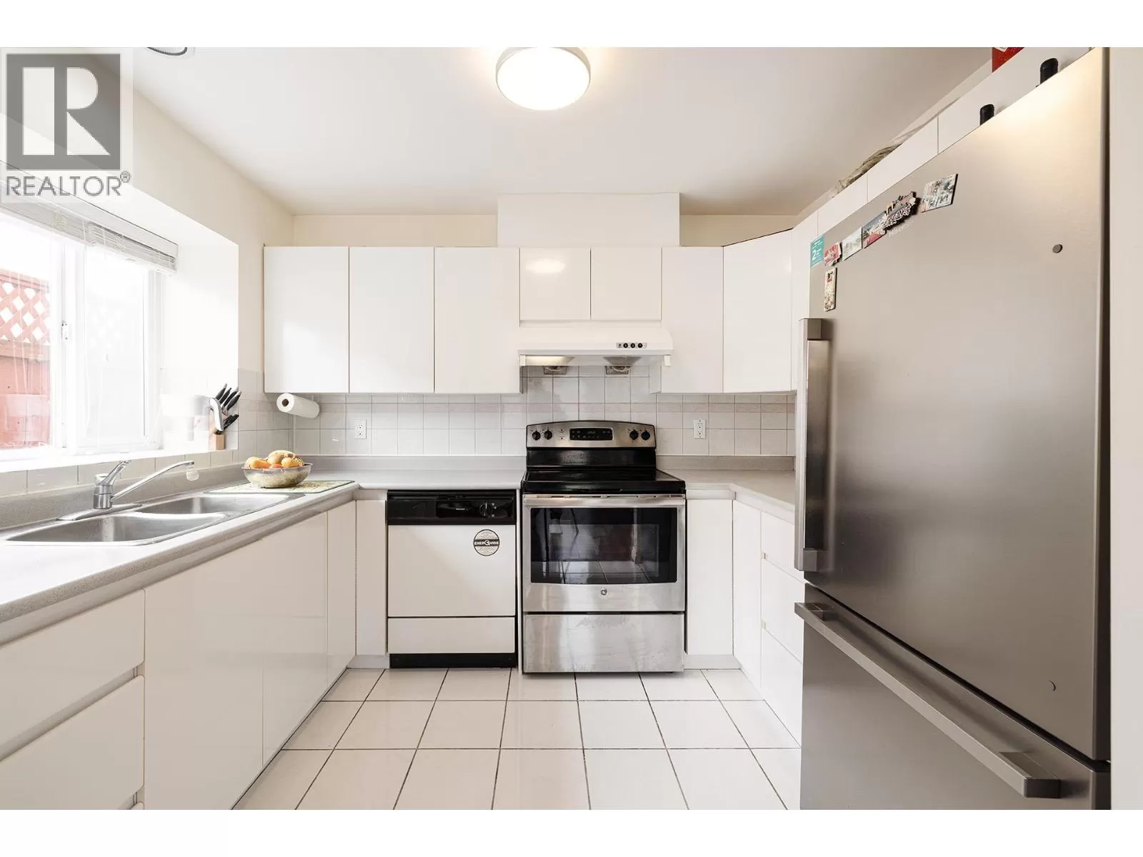 Duplex for rent: 8573 Laurel Street, Vancouver, British Columbia V6P 2X6