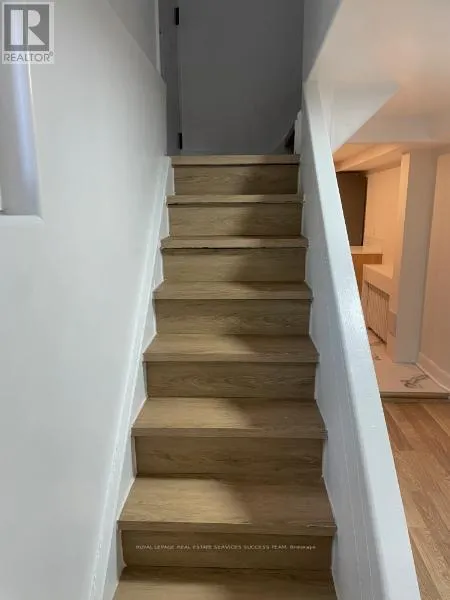 Triplex for rent: Bsmt - 10 Don Mills Road, Toronto, Ontario M4J 3Z7