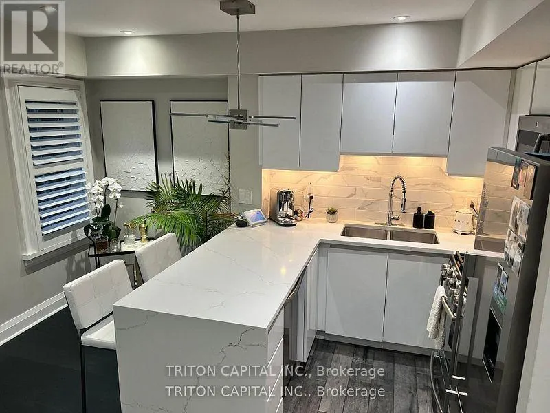 Row / Townhouse for rent: Th99 - 9 Windermere Avenue, Toronto, Ontario M6S 5A4