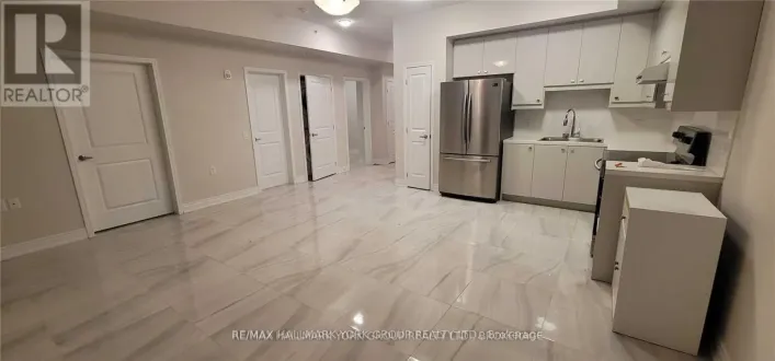 102 - 32 WELLINGTON STREET E, Aurora