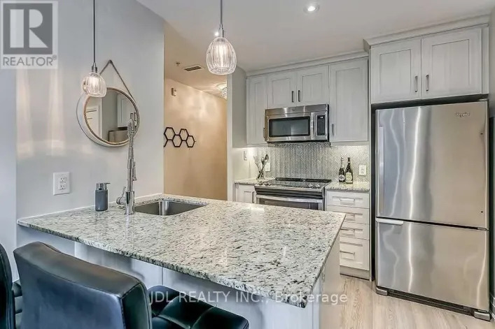 104 - 73 WASHINGTON AVENUE, Oakville