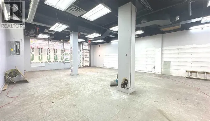 105, 233 Centre Street SW, Calgary