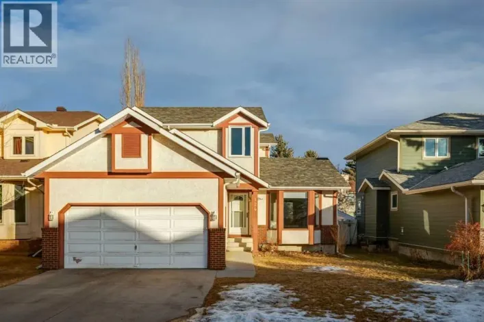 124 Woodmark Crescent SW, Calgary