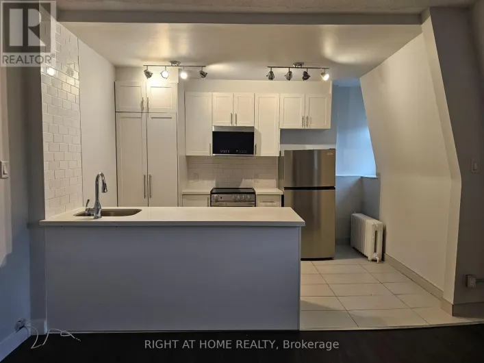 203 - 72 WELLESLEY STREET E, Toronto