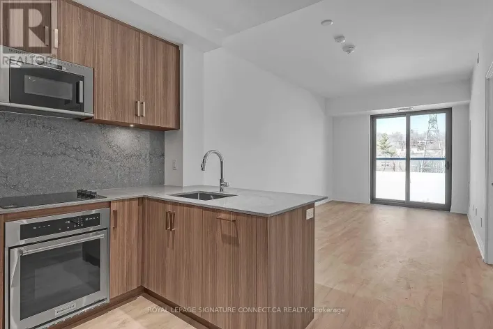 303 - 280 HOWLAND AVENUE, Toronto
