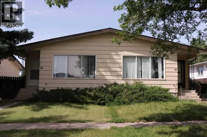 Multi-Family for sale: 48 and 50 Jerry Potts Boulevard W, Lethbridge