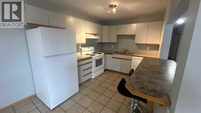 8, 6203 Bowness Road NW, Calgary