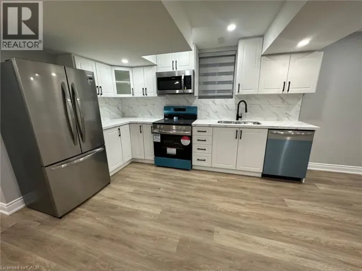 906 FARMSTEAD Drive Unit# Lower, Milton
